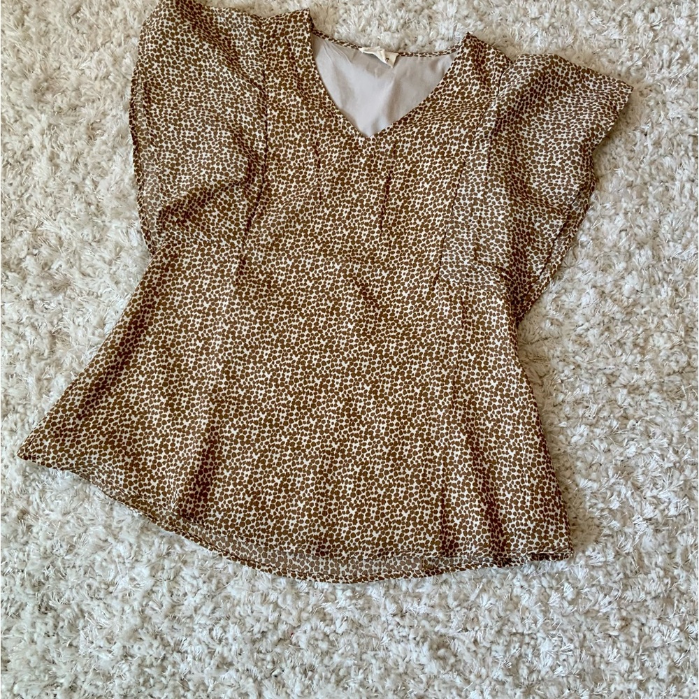 Boutique blouse. Tan and off-white. Worn once and dry cleaned. Size small.